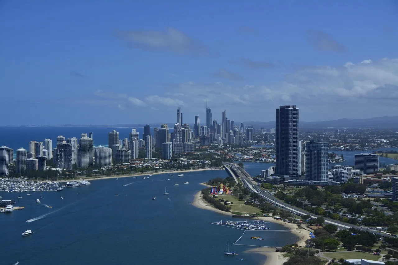 Gold Coast skyline seen along the beach at Surfers Paradise