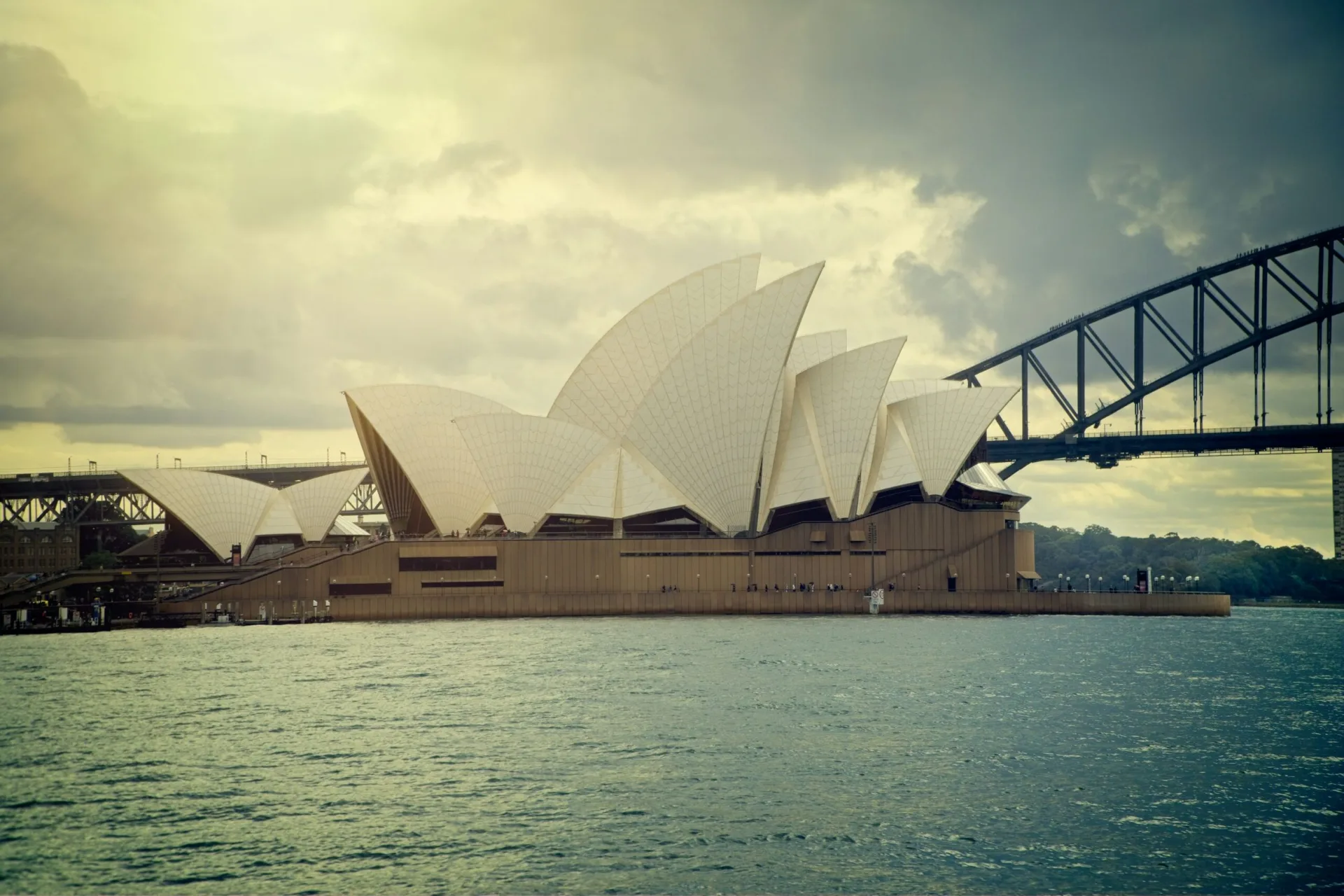 Sydney Opera House and the harbour at dusk